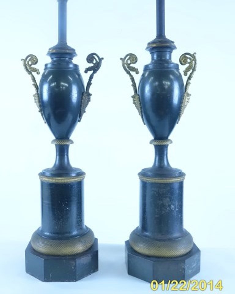 Pr French Empire Tole and Bronze Urns: 19th Century With gilt bronze scrolled masked handles and trim mounted as lamps. Fitting to finish and small dent. 35"H X 7"W