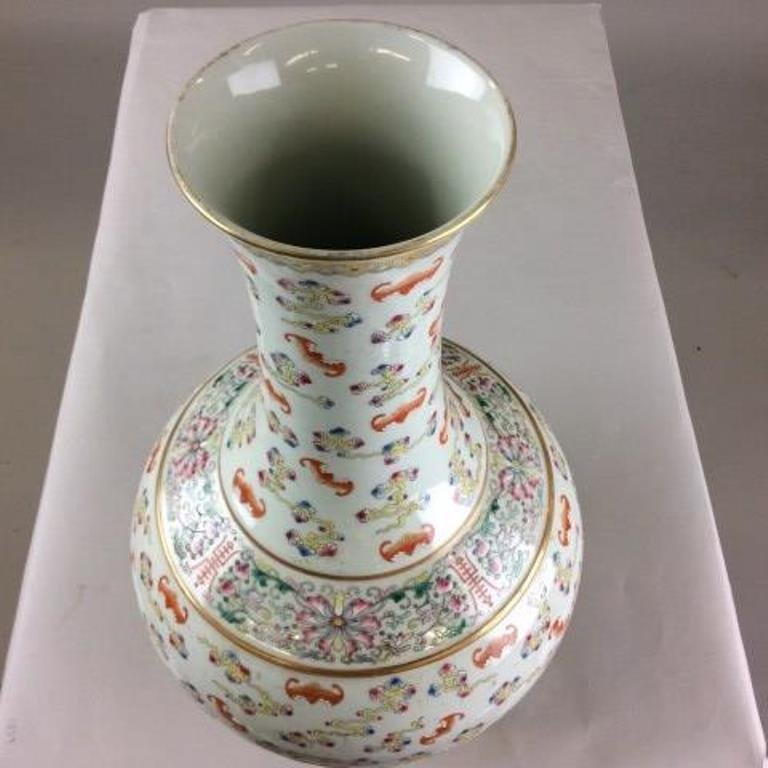 Chinese Guangxu's Reward Porcelain Vase: 19th / 20th C, A Bolbous body with slender waisted neck, famille rose over all design, having heavy enameled forming a band around shoulder and rim. Decorated with bats, Ruyi, scrolling Linen, and Lon