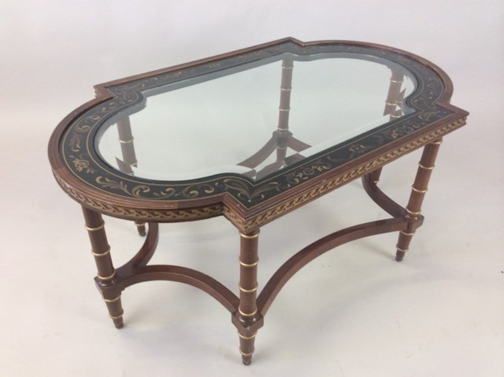 Glass Inset Coffee Table John Widdicomb: The wood frame work has a black lacquer banded top with gilt decoration on cylindrical tapering legs with convex stretchers. Good condition 19"H X 40 3/4"W X 24 1/2"D