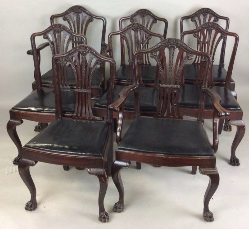 Set 8 Georgian Style Dining Chairs Berkey & Gay: Each with a serpentine crest rail carved with floral and foliate motif. The back splat in a stylized plume dorm. All on cabriole legs ending in paw feet. Green drop in seats. Stamped mark. Condition c