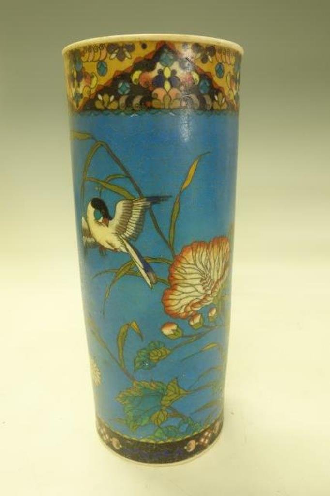 Asian Cylindrical Vase: Porcelain in a closinae form with birds on flowering branches. Character marks to base. 12"H %"D 12 1/8" h x 5" Dia.