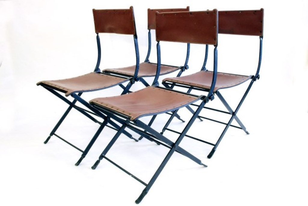 Set of Four Italian Jansen Style Chairs: Brown leather and black Iron Jansen style chairs. Each 34"H X 16 1/2"W X 20"D