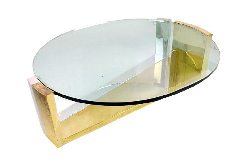 Brass and Steel Coffee Table: Probably by Karl Springer. A high quality construction in a triangular form with drop in glass top. 17"H X 58"W X 48 1/2"L 17"H X 58"W X 48 1/2"L