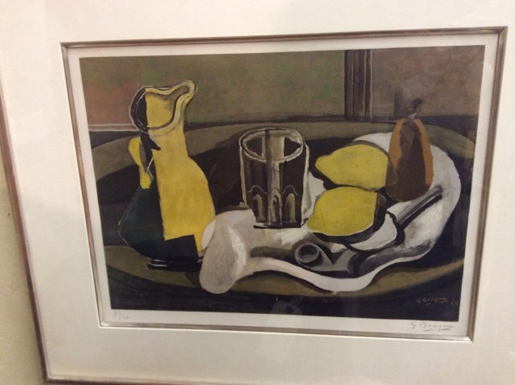 Georges Braque (French, 1882-1963) Lithograph: Still Life with Lemons and Pipe. Signed lower right and numbered lower left 7/30 in pencil. Paper stamped lower left - S in a shield. Custom silver leaf frame. Image 1 3/4"H X 17 7/8" Overall 22"H X 2