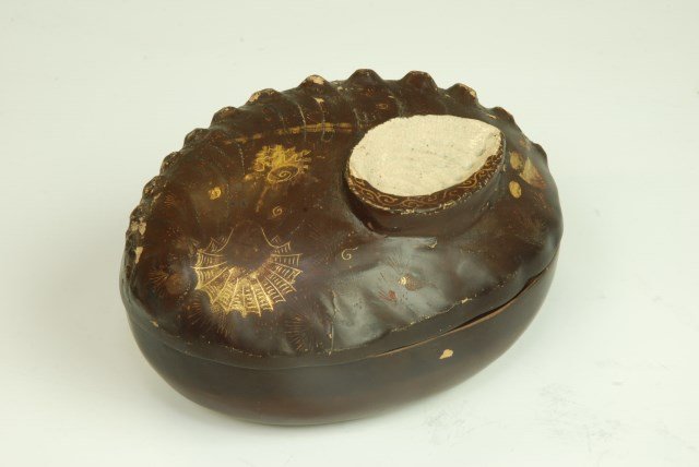 Japanese Shell Form Porcelain Box: Asian shell form porcelain or clay box in dark brown with gilt decoration. Interior and interior lid painted in a floral decoration.