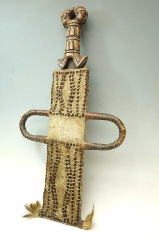 African Dance Wand Animal Skin: Dance wand wood carved with animal skin decoration 21"H X 11 1/2"W