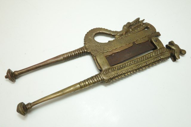 Indonesian Nut Cutter: Dragon and dog motif nut cutter 9"L X 3 1/2"W