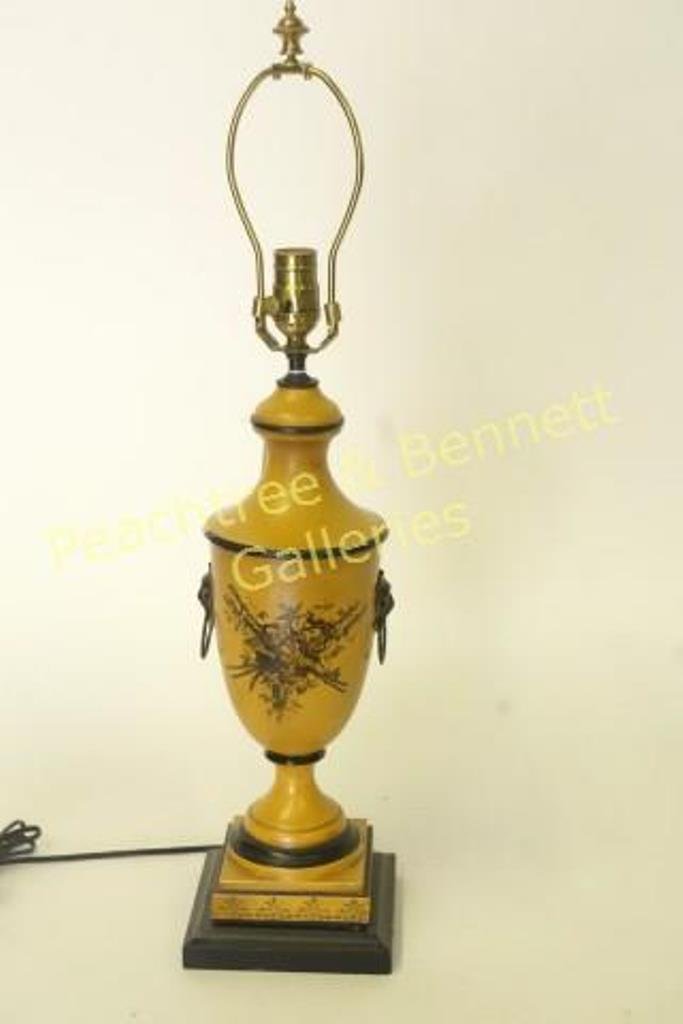 Yellow Tole Lamp: Urn form yellow tole lamp with applied lion's head handles and bouquet decoration 21"H to socket