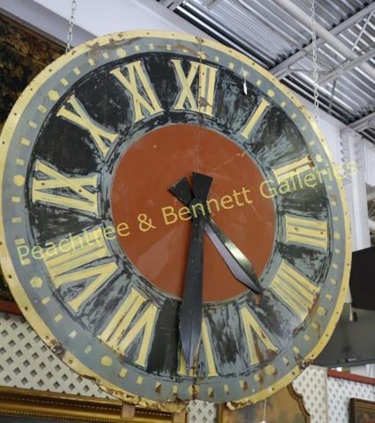 Early 20th C. Clock Face: Circular painted metal clock face with Roman numerals and two black hands. 53" Diameter