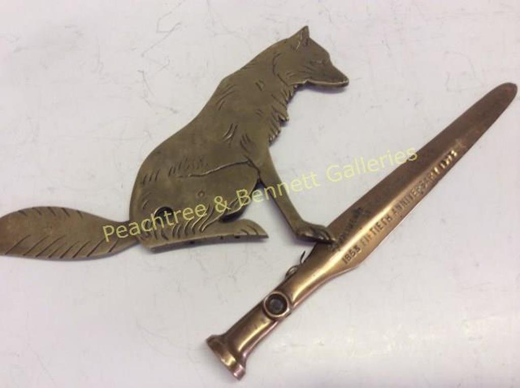 Pair American Cigar Cutters & Lighter: One Home Insurance Co. Anniversary cutter dated 1903 with Dog form cutter. And a vintage electric cast iron lighter in the form a terrier. 8" L and 5" X 7", respectively.