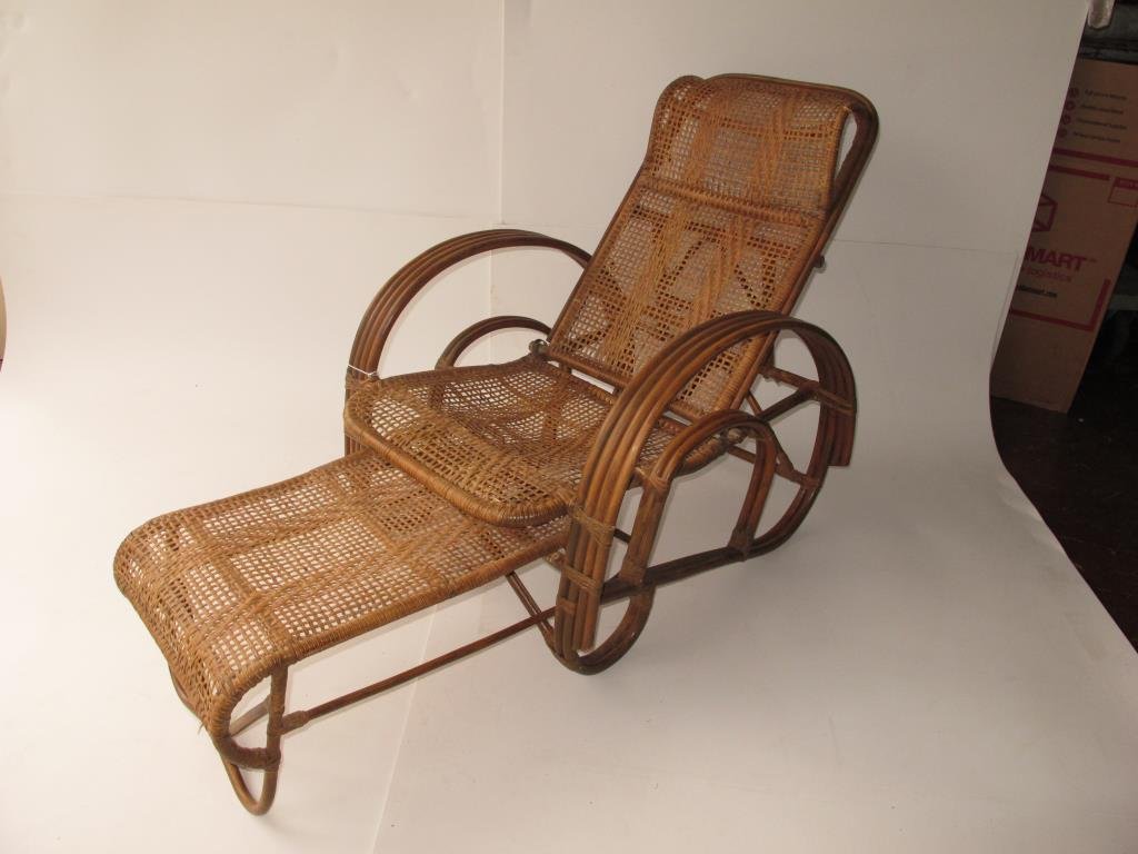 Rattan Steamliner Chaise with Ottoman: Steamliner Rattan Chaise with attached Ottoman c 1910-1920 having bent wood arms and sides with raised head rest, three level adjustable back and ottoman which slides under chair when not in use heigh