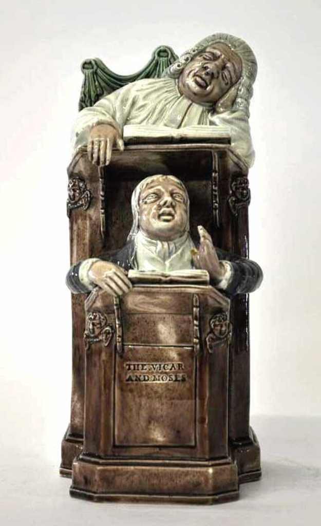 19th Century The Vicar and Moses Figurine: Excellent example of the Staffordshire Vicar and Moses figurine. Finely modelled decoration along stands and in the faces of the judge and his clerk. The judge tires as his clerk carries on below. Gla