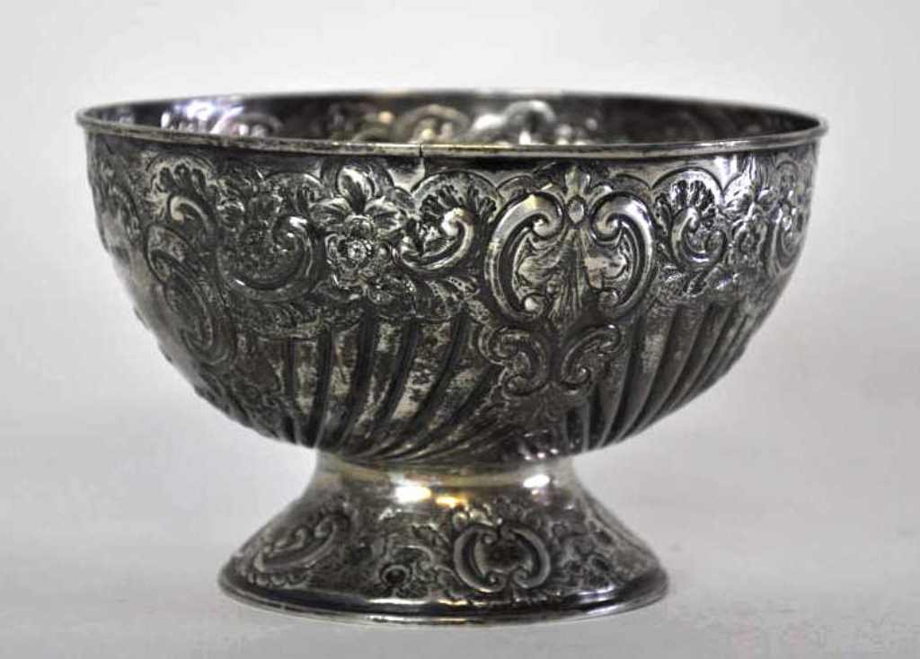 English 19th C. Sterling Silver Repousse Bowl: By C. Packer + Co. Regent Street, London. Footed sterling silver bowl with repousse design in scrolling foliage and floral motif. English silver marks on the side include a “G.W.” maker's mark and