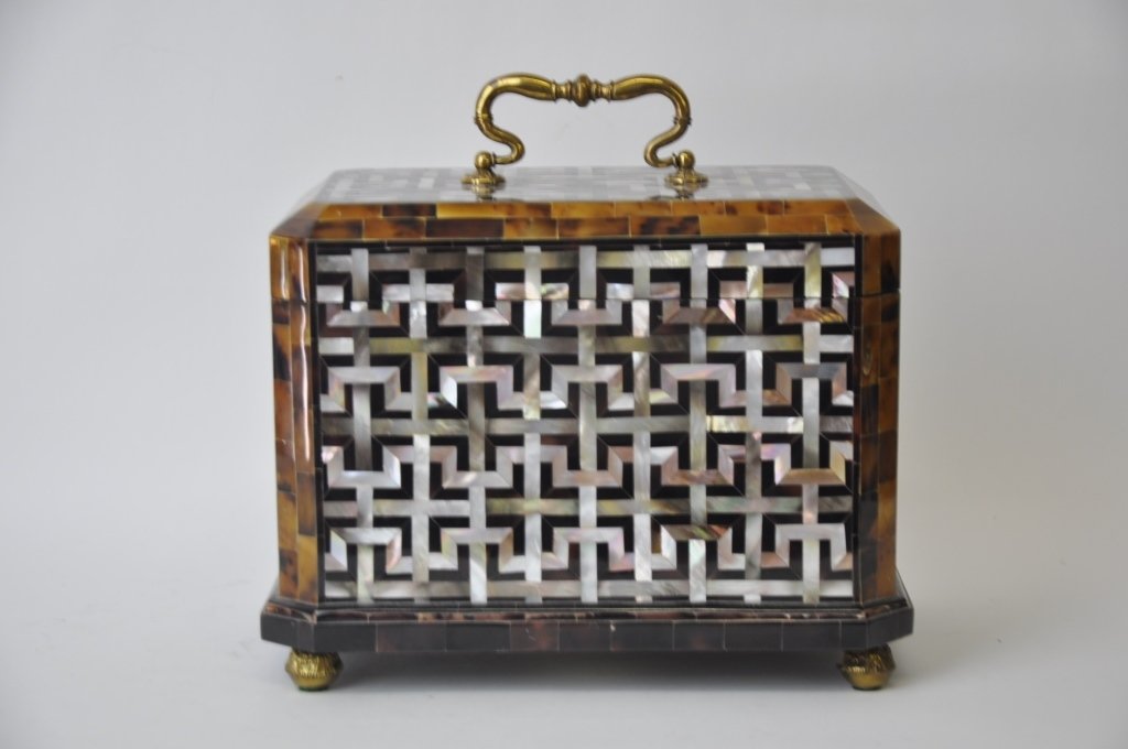 Mother of Pearl and Stone Inlaid Box: Mahogany box inlaid with mother of pearl and a brown speckled stone having brass mount handles and bun feet. In good condition. 11 inches height, 12 inches width, 8.5 inches depth. 11"H x 12"W x 8.5"D
