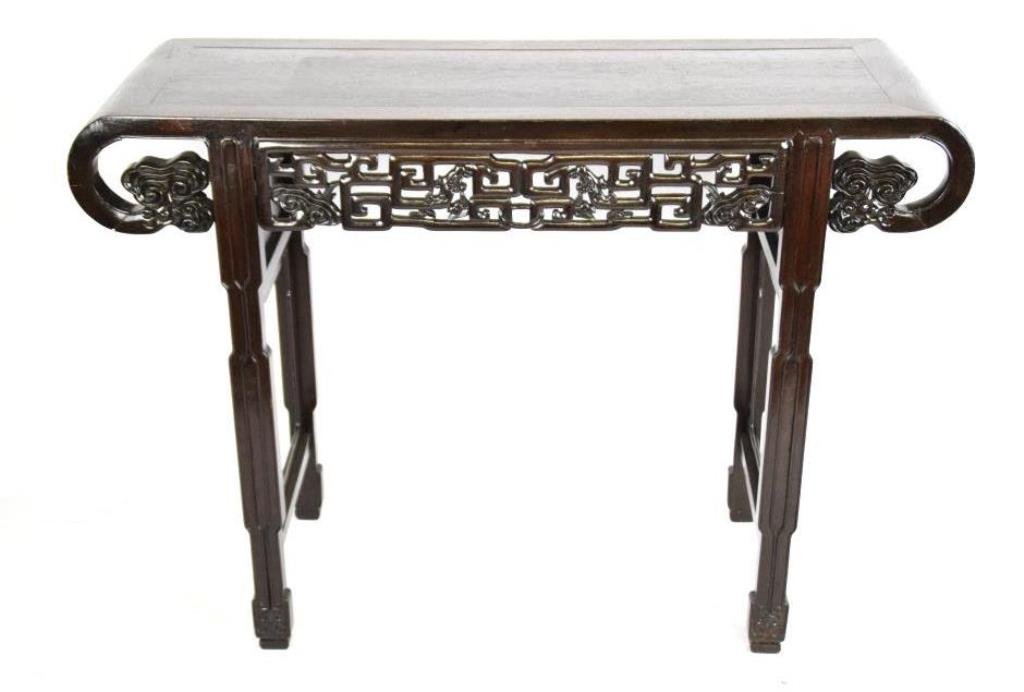 Chinese Altar Table: Having a pierce carved apron,and raised on four straight, tapered legs surrported by side struts. 33 inches height, 46 inches width, 16.75 inches depth. 33"H x 46"W x 16.75"D. Scratching to top. Measu