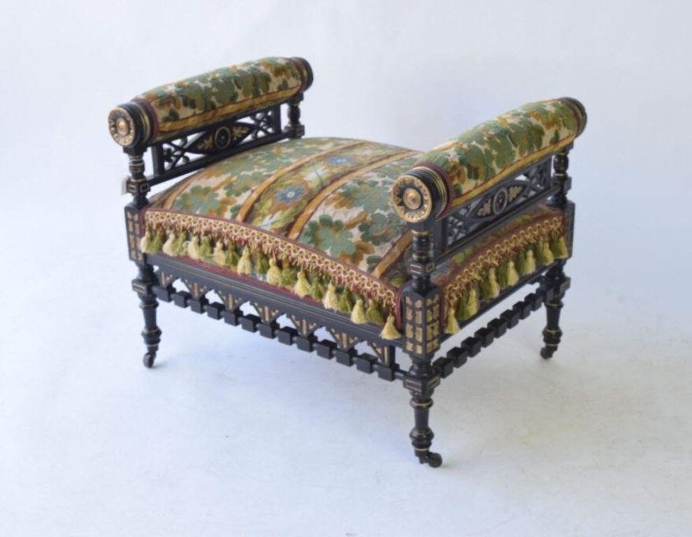 Renaissance Victorian Esthetic Sunflower Bench: Renaissance Victorian Esthetic Sunflower Bench having ebonized wood with gilt highlight , newer colorful upholstery with tassels height 22" width 31" depth 21" 22" H x 31" W x 21" D Very good