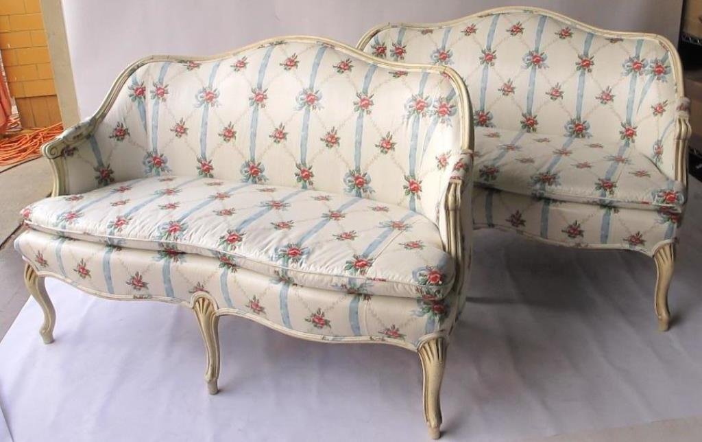 Pair French Floral Settees: Settees having white upholstery with subtle stripes and pink and green rose pattern by Lord's Custom Upholstery, Inc. Having carved white painted wood frame with five cabriole legs. 33.5 inches height