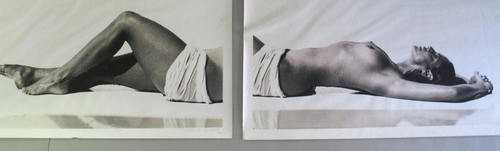 Pair of Signed Michel Comte (1954-) Prints: Pair of black and white photographic prints signed by Michel Comte. Each depicting one half of a nude woman lying on her back covered with water droplets and having a white fabric wrapped around her h