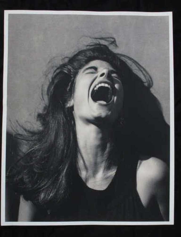 Laura San Giacomo Portrait by Michel Comte: Black and white photographic print on baryta paper depicting actress Laura San Giacomo laughing. By accalimed Swiss fashion photographer Michel Comte. Pencil marks from artist on verso. 20 inches heig