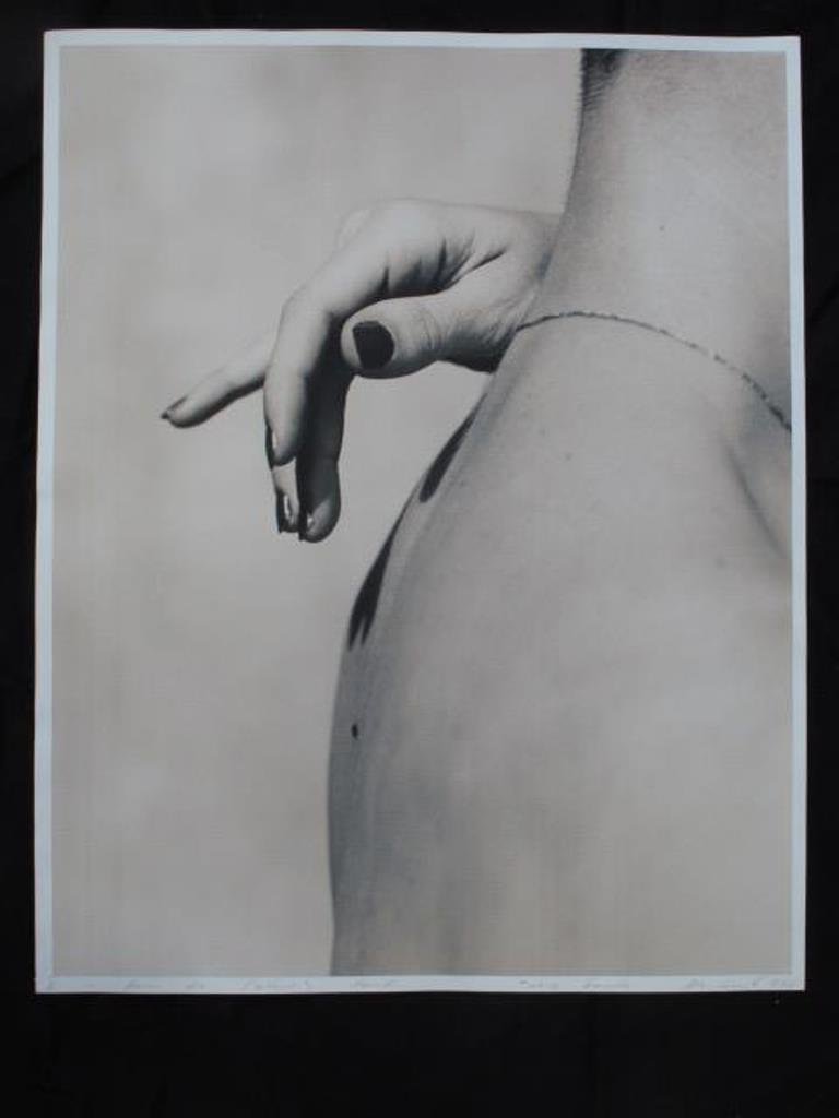 Signed Michel Comte (1954-) Photographic Print: Photographic print on baryta paper by Michel Comte. Depicting a woman's hand over a man's shoulder in black and white. Pencil signed by artist to bottom. 20 inches height and 16 inches width. 20"H x 1