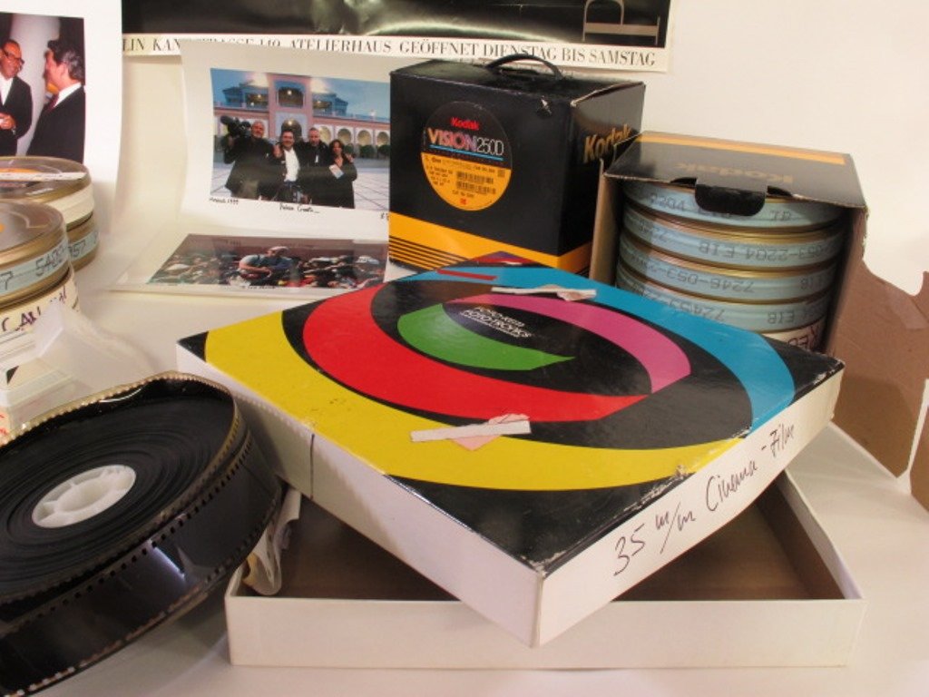 Michel Comte Film Collection: Group of 20 Kodak Vision250D Color Negative Film rolls from storage unit of Michel Comte. Also including two larger rolls labeled "Bob Evans" and "Max Factor: Hopping Red Lips" & "Behind the Scenes."