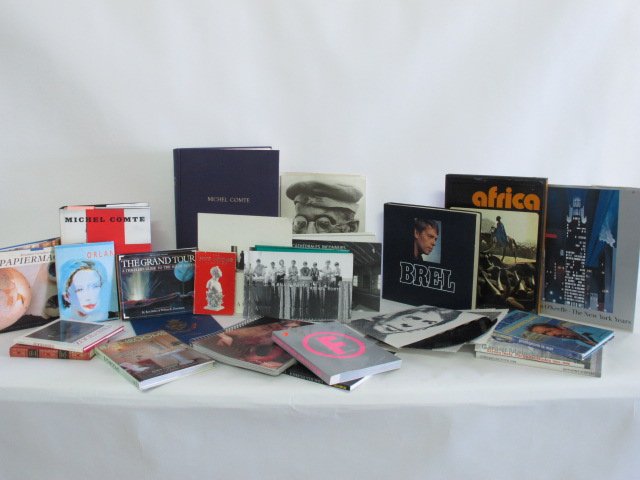 Art Book Collection: Group of art books from the estate of Michel Comte. Including "People and Places With No Name" by Michel Comte, "Zoobabies" by Michael O'Neill, "The Jeff Koons Handbook," "Andy Warhol's Factory Photos