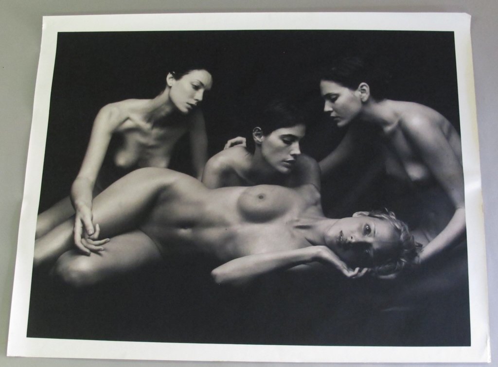 Michel Comte (1954-) Print Nude of Women: Large black and white print on paper entitled "Michelle Mary Anne Tracy and Satya" by Michel Comte. Depicting four nude women in repose. Embossed studio mark. Unframed and unsigned. 40 inches height,