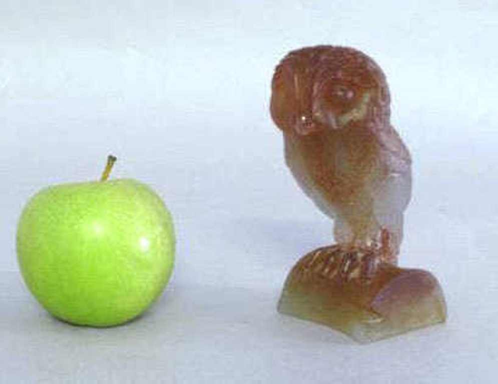 Daum France Pâte de Verre Owl Figure: Pâte de verre owl figure. Having amber color with textured feathers and face and marked Daum France to rectangular bottom. 5.5"H x 3"W x 2"D Measurements:5.5"H x 3"W x 2"D NOTE: Please carefully read