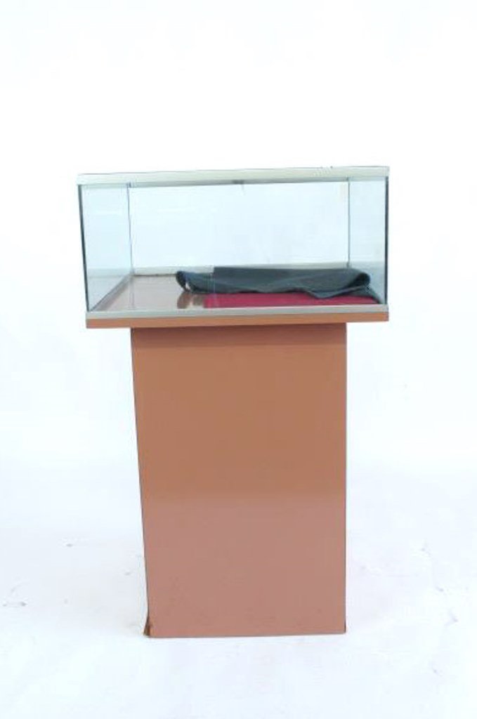 Department Store Display Case: Glass Showcase with square laminated surface pedestal below 42" H x 24" W x 24" D Dimensions:42" H x 24" W x 24" D
