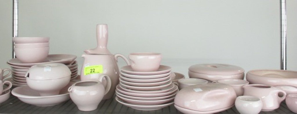 Iroquois Casual China Russel Wright: Pink. Consisting of: Pink carafe and pitcher, lidded bowl, butter covered dish, 5 cups, 2 lidded dishes, 2 divided plates, 5 diner plates, oval tray, circular bowl, 3 shakers, 4 cereal bowls. 43 pcs t