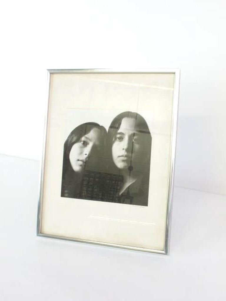Art Photography Portrait of Twins: Black and white art photography portrait of twins signed lower right on mat board Bruce Davidson housed in quarter inch chrome frame under glass photograph measures 7.7" H x 7.5" W overall 14.25" H x
