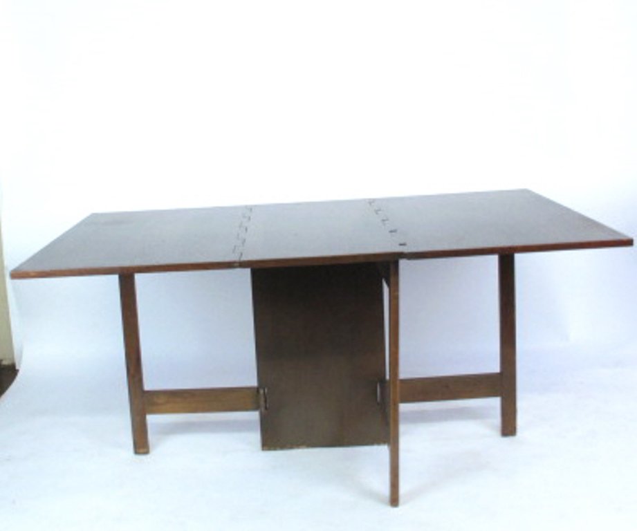 Drop Leaf Dining Table: Gate leg modern design with fitted padded cover 29.75" H x 65" W x 40" D Good used Dimensions: 29.75" H x 65" W x 40" D