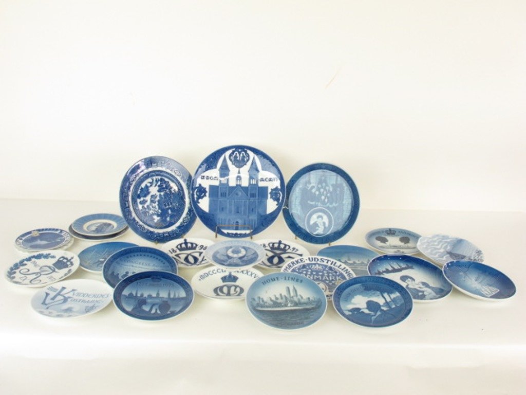 26 Royal Copenhagen Plates: Approx. 25 blue and white plates. 24 with various Royal Copenhagen marks. 1 Blue Willow. 11 inches diameter and less. Dimensions: