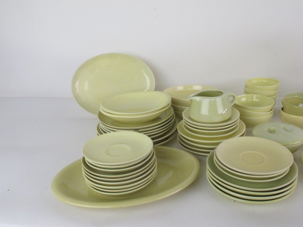 Iroquois Casual China Russel Wright Yellow Group: Group of approx.80 pieces (includes lids) yellow Iroquois Casual China by Russel Wright. Some unmarked. Largest 9 inches diameter, various Iroquois Casual China by Russel Wright marks. Dimensions: