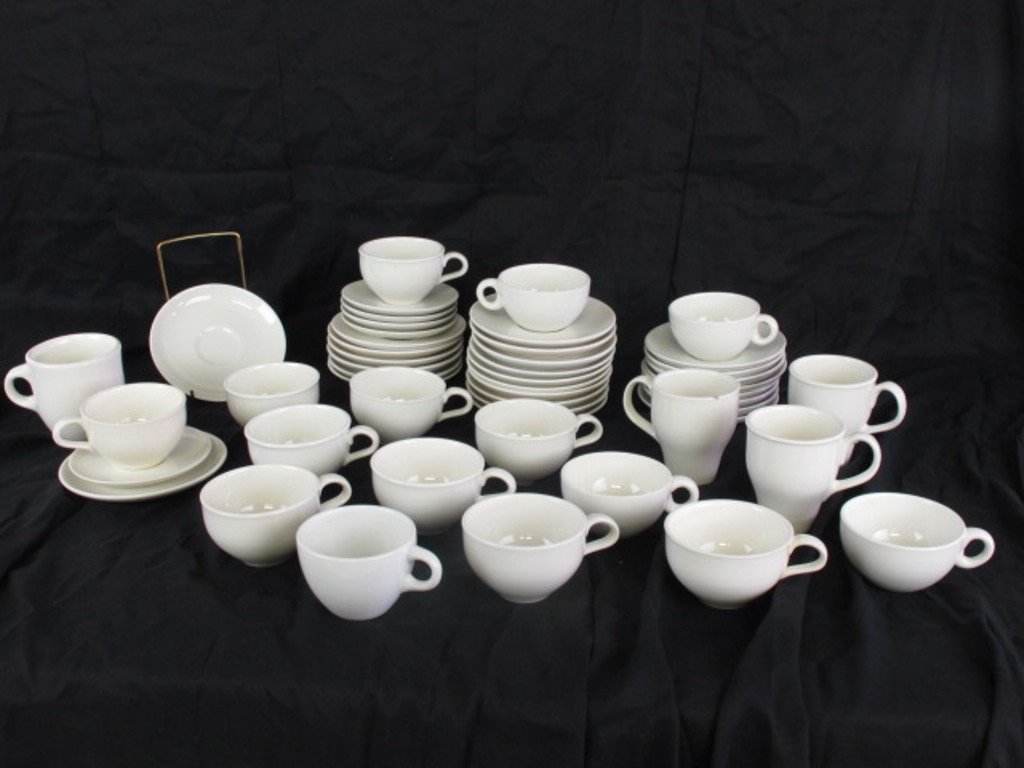 Iroquois Casual China Russel Wright Cups Saucers: White. 19 Cups and 25 saucers. Iroquois Casual China Russel Wright marked two different ways. Dimensions: