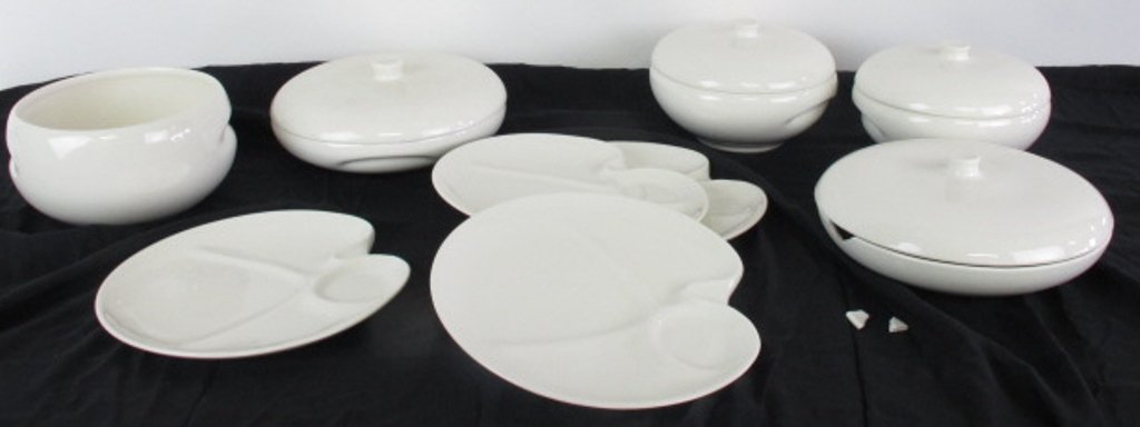 Iroquois Casual China Russell Wright Serving Pcs: White. 9 Pieces. 4 serving plate, 4 cover serving dishes and 1 serving bowl with no lid. Largest 4 inches height by 11 inches diameter. 2 different marks for Iroquois Casual China Russel Wright. One c