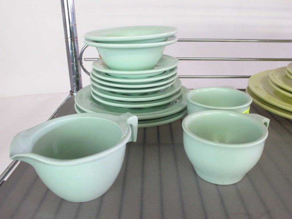 Russel Wright Melador 14 Pieces Light Green Dishes: 14 pieces light green plastic Russell Wright dinnerware by Melador dishes. Various sizes Good used Dimensions: Various sizes