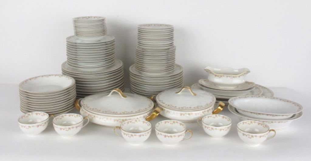 Large Stern Brothers Haviland Limoges China Set: China set comprised of 95 pieces by Haviland Limoges France. Marked Stern Brothers New York to bottom. Having pink rose and gilt pattern. 3 inches height, 11.5 inches width, 8 inches depth for largest