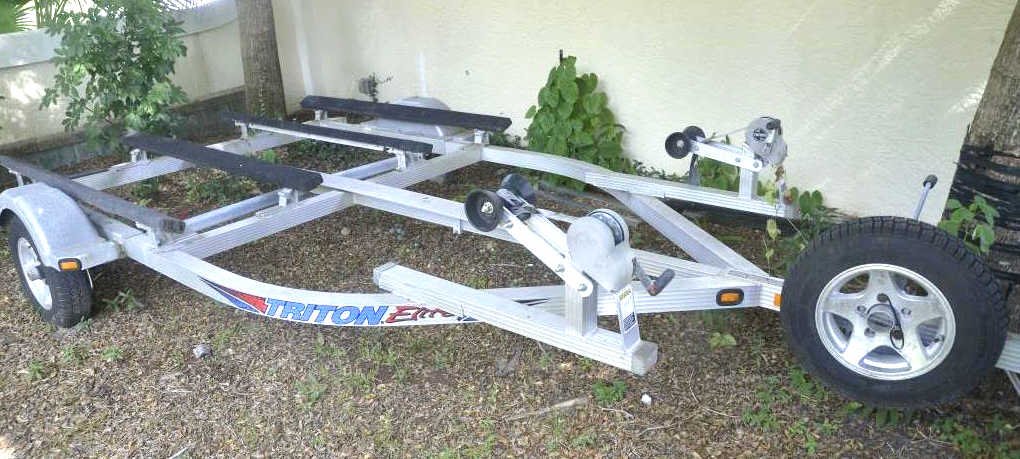 Triton Elite Aluminum Double Jet Ski Tradable: Contents of office. Good condition. Good condition. Good condition Pick Up or Shipping Details:This item is located in Sarasota, FL 34231. PICK UP: Sun – Tuesday, November 13 – 15, 10AM - 2PM. SHI