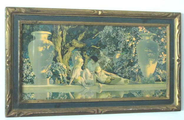 Maxfield Parrish (1870-1966) "Garden of Allah": Lithograph on paper of Maxfield Parrish's "Garden of Allah." Depicting 3 female figures reclining on the side of a pool with two large vases and foliage behind. Housed in a carved gilt frame. 8.75 inc