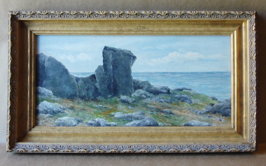 Welsh Coastline Oil Painting G. Gilley Cornwall: The Cot (Carbis Bay, Cornwall) by G. Gilley, signed and tilted verso. Dimensions: 6.5" X 13.5". An emotive dipiction of the famous Natural Welsh site - the stone formation which resembles a cot. Circa