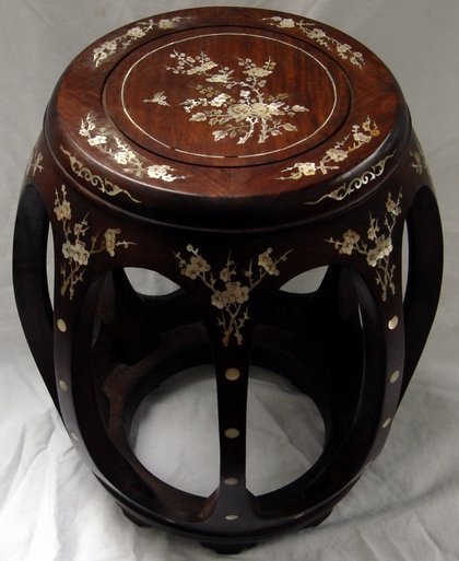 Antique Chinese Rosewood Barrel Stool MOP Inlay: Striking eight legged antique Chinese rosewood barrel stool with exquisitely fine mother of pearl inlay depicting flowers and song birds. Dimensions: 17.75" high X 14.25" diameter.