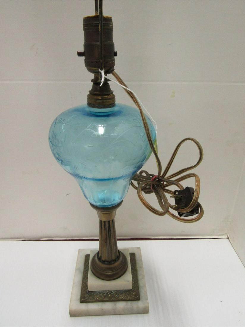 PARKESBURG LAMP: AQUA BLUE PARKESBURG LAMP. WHITE MARBLE BASE. ELECTRIFIED WITH HARP ABOVE. 17" TALL X 5 1/2" ROUND.