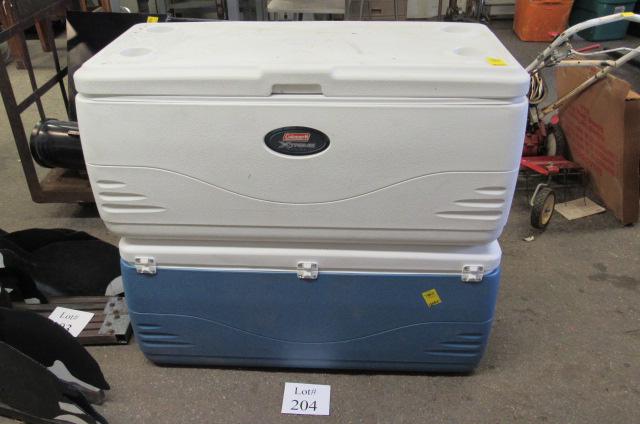 (2) Coleman Coolers: (2) Coolers Including White Coleman Extreme Marine Cooler, Measures 42" l x 18-1/2" w x 18" h, Blue Coleman Extreme 5 Cooler, Measures 42" l x 18-1/2" w x 18" h, Local Pickup only