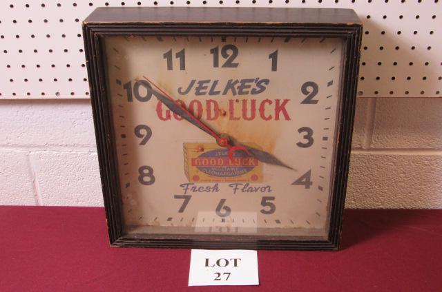 Jelke's Oleomargarine Advertising Electric Wall Clock: Jelke's Good Luck Vegetable Oleomargarine Advertising Electric Wall Clock, Measures 15-1/2" l x 15-3/4" h x 3-1/2" w, Staining on Face and Not Working at Time of Cataloging
