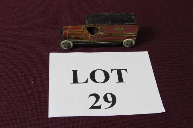 Red and Black German Tin Litho Toy Truck 298: Red and Black German Tin Litho Toy Truck 298, Marked CF on both Sides, Measures 3-1/4" l x 1" w x 1-1/4" h, Paint Loss and Oxidation