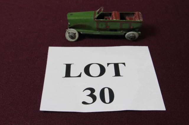 Red and Green German Tin Litho Convertible Sedan: Red and Green German Tin Litho Convertible Sedan, Marked CF on both Sides, Measures 3-1/4" l x 1-1/4" w x 1-1/2" h, Paint Loss and Oxidation