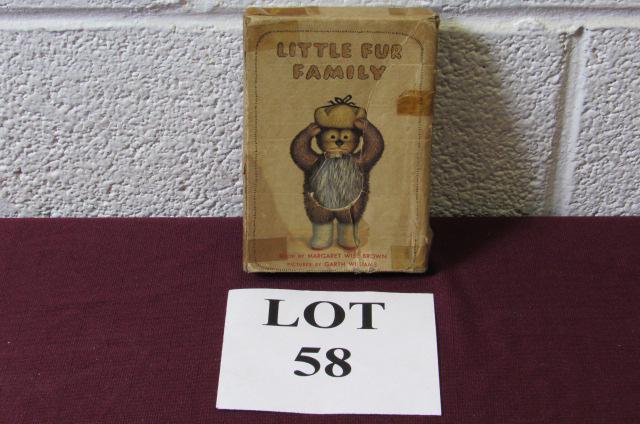 Little Fur Family Book by Margaret Wise Brown: Little Fur Family Book by Margaret Wise Brown with Dust Jacket and Fur Cover, Copyright Harper and Brothers Publishers 1946, Measures 5-1/2" h x 4" w, Tape on Dusk Jacket