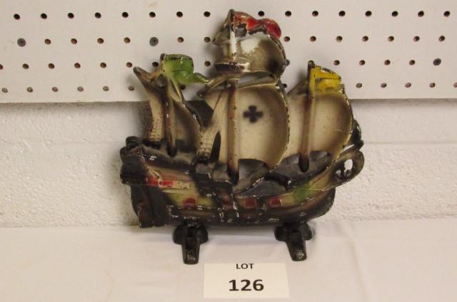 Cast Iron Pirate Ship Doorstop: Cast Iron Pirate Ship Doorstop. Measures 9-1/2" l x 3" w x 12" h