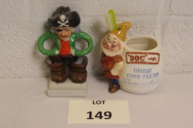 (2) Vintage Tooth Brush Holders Including Pirate: (2) Vintage Ceramic Tooth Brush Holders Including Pirate Made in Japan and Doc from the Seven Dwarfs Marked Doc, Brush Your Teeth, Snow White, Stamped Walt Disney Productions on the Bottom